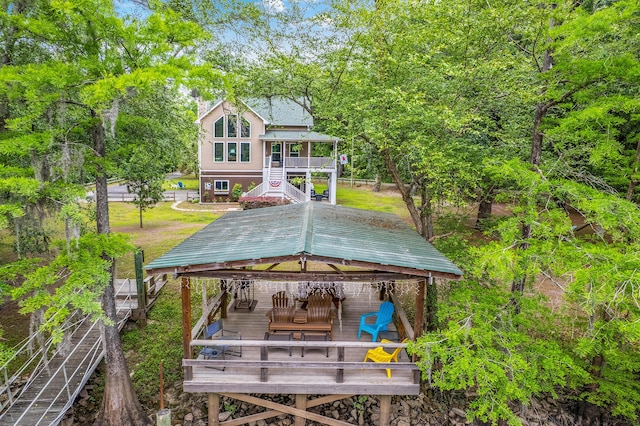 100 Canal Rd, Saint George, SC 29477 - view of home's community featuring stairway, a wooden deck, a yard, and a gazebo