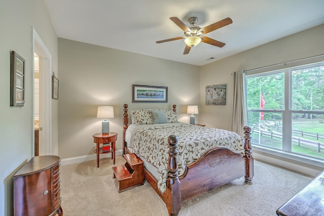 100 Canal Rd, Saint George, SC 29477 - bedroom with carpet, baseboards, and ceiling fan
