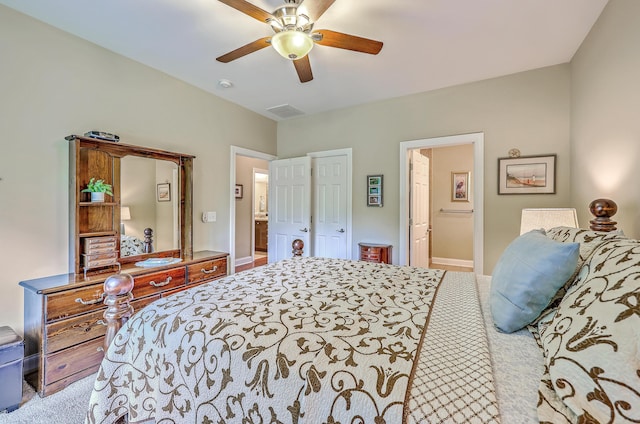 100 Canal Rd, Saint George, SC 29477 - bedroom with ensuite bath, ceiling fan, and carpet flooring