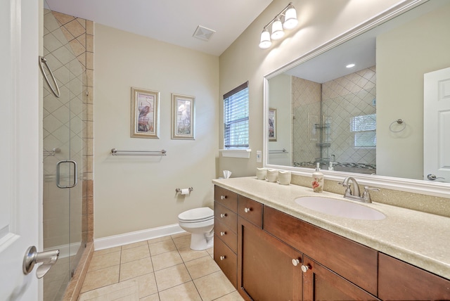 100 Canal Rd, Saint George, SC 29477 - full bath featuring tile patterned flooring, a stall shower, baseboards, toilet, and vanity