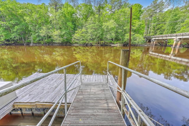 100 Canal Rd, Saint George, SC 29477 - dock with a water view and a wooded view