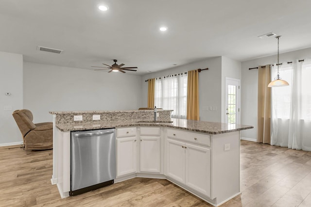 9998 Winged Elm St, Ladson, SC 29456 - kitchen with dishwasher, a sink, a ceiling fan, light wood-style floors, and light stone countertops