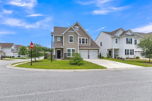 9998 Winged Elm St, Ladson, SC 29456 - view of front facade with driveway, a front yard, a residential view, and a garage