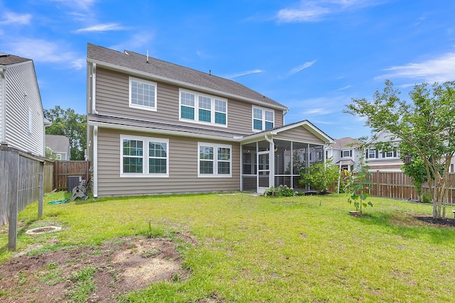 9998 Winged Elm St, Ladson, SC 29456 - rear view of house featuring a sunroom and central AC
