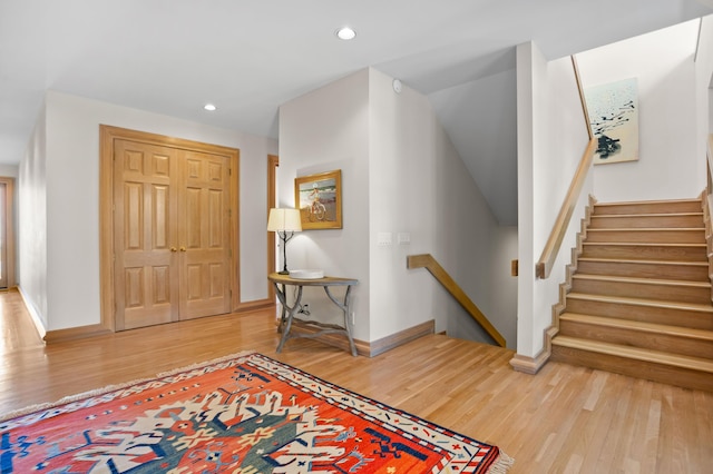 foyer entrance with wood-type flooring