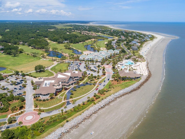 bird's eye view featuring a water view and a view of the beach