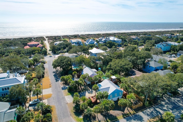 bird's eye view featuring a water view and a residential view