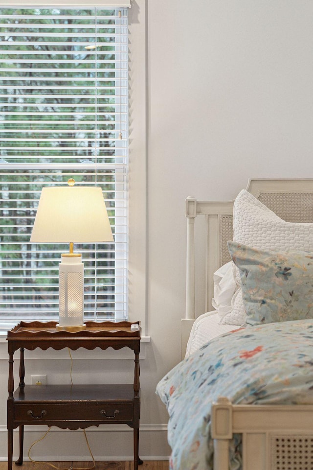 bedroom featuring baseboards