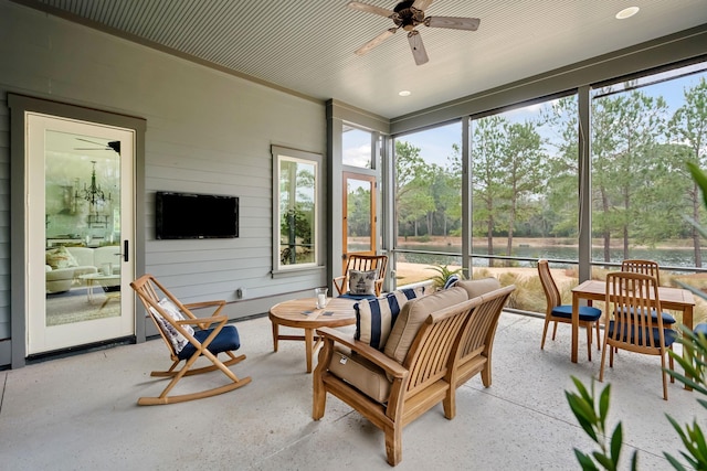 sunroom / solarium with ceiling fan