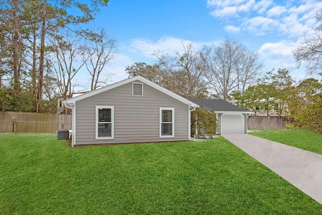 single story home featuring a garage, central AC, and a front yard