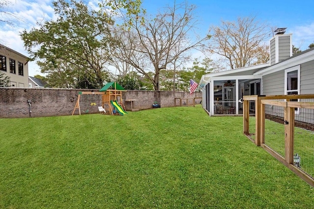 view of yard featuring a playground