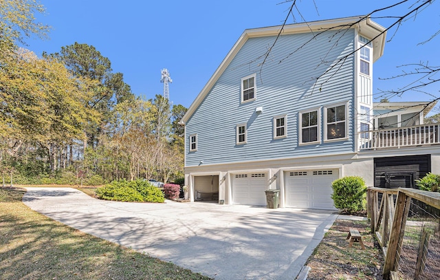 view of property exterior with a garage