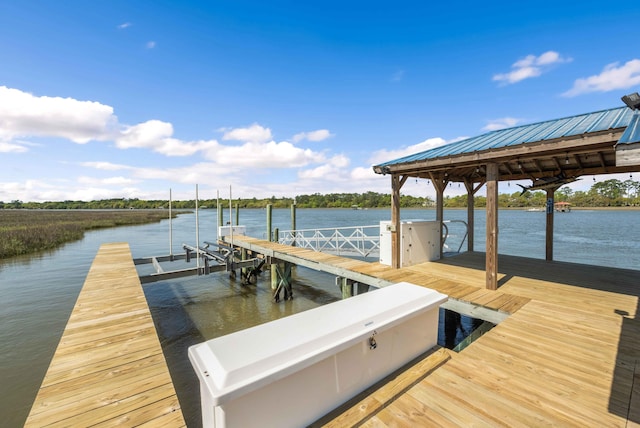 dock area featuring a water view and boat lift