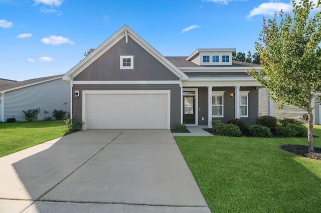 view of front of home with a front yard and covered porch