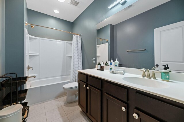 full bathroom featuring tile patterned flooring, shower / bathtub combination with curtain, toilet, and vanity