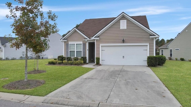 view of front facade featuring a garage and a front yard