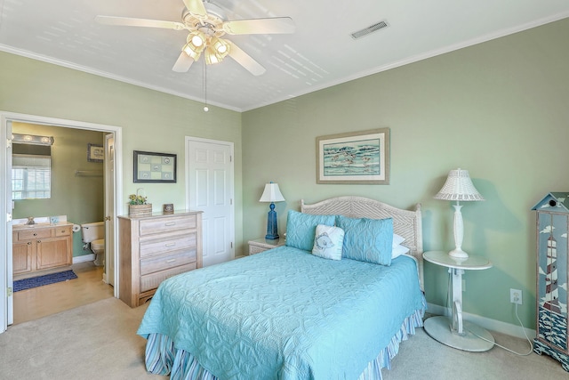 2393 Folly Rd Unit 1G, Folly Beach, SC 29439 - bedroom featuring carpet flooring, crown molding, baseboards, connected bathroom, and ceiling fan