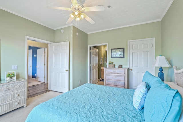2393 Folly Rd Unit 1G, Folly Beach, SC 29439 - bedroom with carpet, ensuite bathroom, crown molding, and ceiling fan