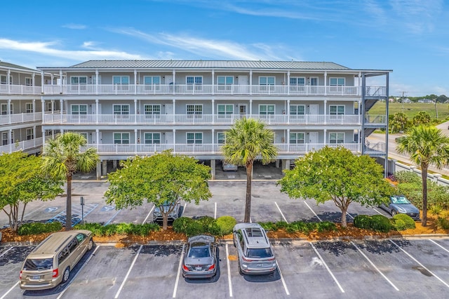 2393 Folly Rd Unit 1G, Folly Beach, SC 29439 - view of apartment building / complex featuring uncovered parking