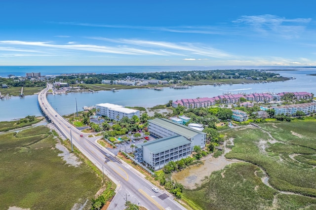 2393 Folly Rd Unit 1G, Folly Beach, SC 29439 - drone / aerial view of a large body of water, apartment complex / building, and a highway