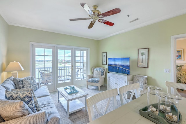2393 Folly Rd Unit 1G, Folly Beach, SC 29439 - living area featuring crown molding and ceiling fan