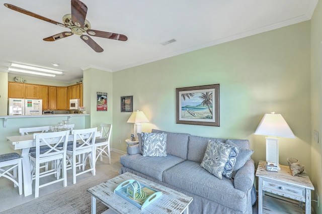2393 Folly Rd Unit 1G, Folly Beach, SC 29439 - living room with a ceiling fan, crown molding, and baseboards