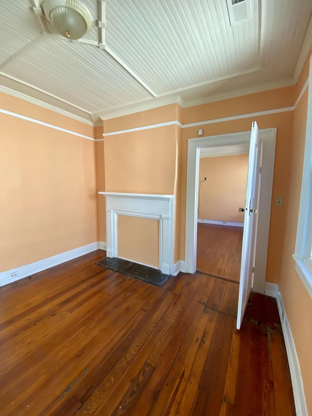 unfurnished living room with wood-type flooring