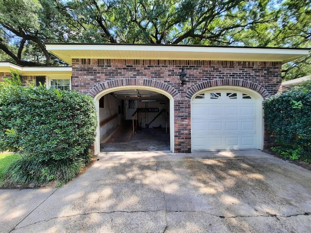 garage featuring driveway