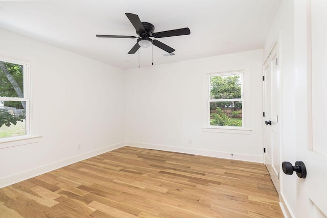 1199 Island View Dr, Mount Pleasant, SC 29464 - empty room with light wood finished floors, baseboards, and ceiling fan
