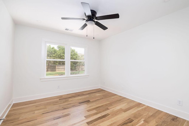 1199 Island View Dr, Mount Pleasant, SC 29464 - spare room with baseboards, light wood finished floors, visible vents, and a ceiling fan