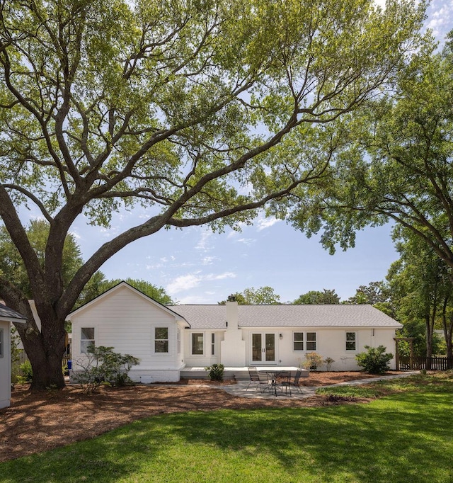 1199 Island View Dr, Mount Pleasant, SC 29464 - back of house featuring a patio area, french doors, and a lawn