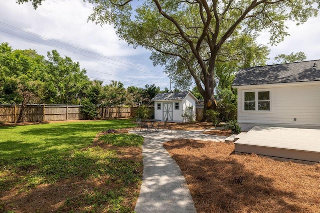 1199 Island View Dr, Mount Pleasant, SC 29464 - view of yard featuring a fenced backyard, an outdoor structure, a shed, and a deck