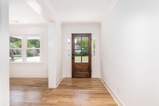 1199 Island View Dr, Mount Pleasant, SC 29464 - foyer featuring baseboards, light wood-style floors, and crown molding