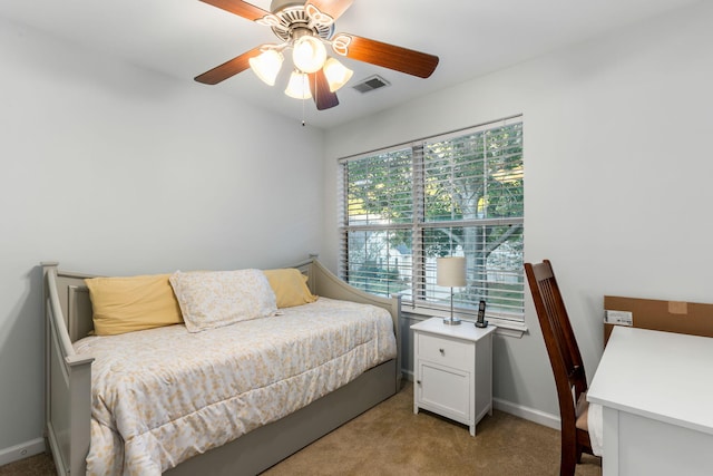 carpeted bedroom featuring ceiling fan