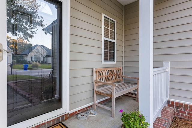 view of exterior entry featuring a porch