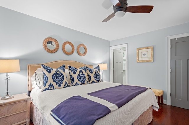 bedroom featuring ceiling fan and dark hardwood / wood-style floors