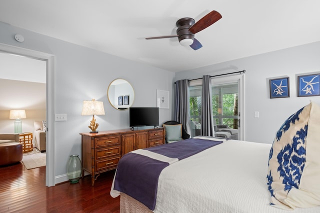 bedroom with ceiling fan and dark hardwood / wood-style floors