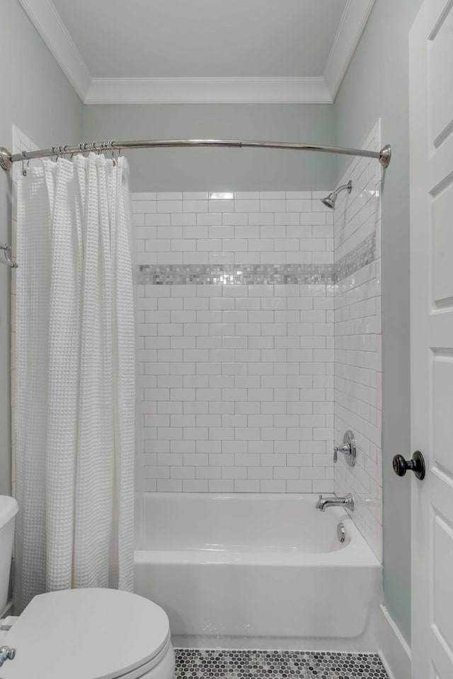 full bathroom with tile patterned floors, shower / bath combo with shower curtain, toilet, and crown molding