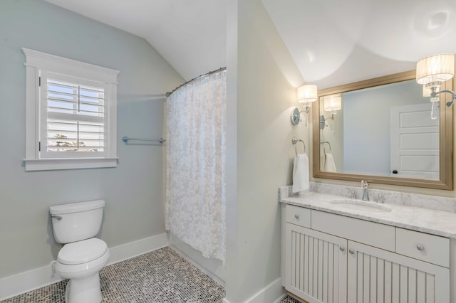 bathroom featuring tile patterned flooring, toilet, a shower with shower curtain, vanity, and vaulted ceiling