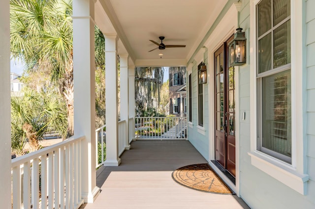 exterior space with covered porch and ceiling fan