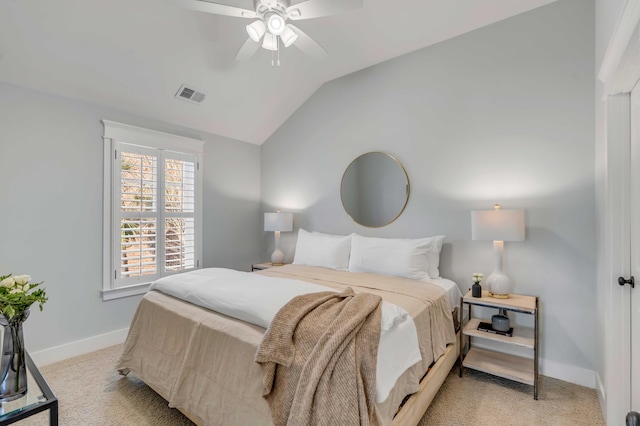 bedroom featuring a ceiling fan, visible vents, vaulted ceiling, baseboards, and carpet