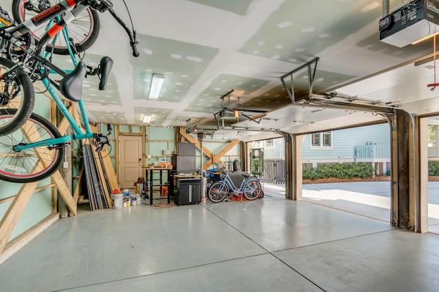 garage featuring a garage door opener