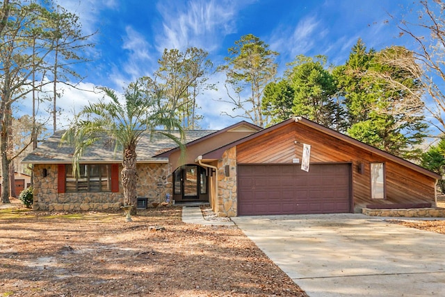 ranch-style home with a garage