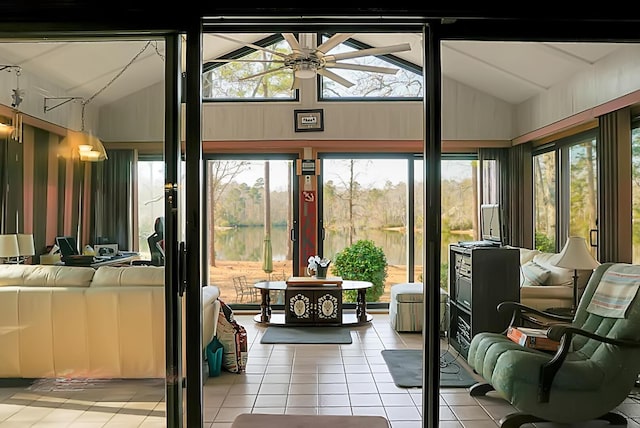 sunroom with vaulted ceiling and ceiling fan