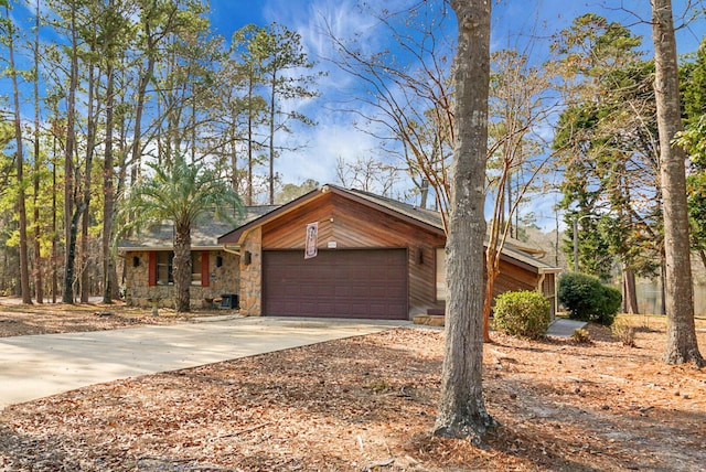 ranch-style house featuring a garage