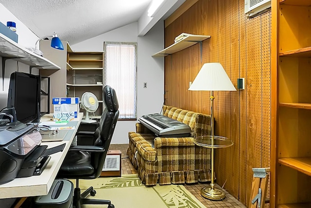 office featuring lofted ceiling and a textured ceiling