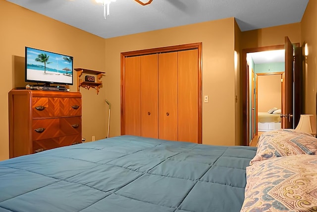 bedroom with a closet and ceiling fan