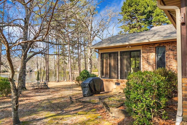 view of yard with a sunroom