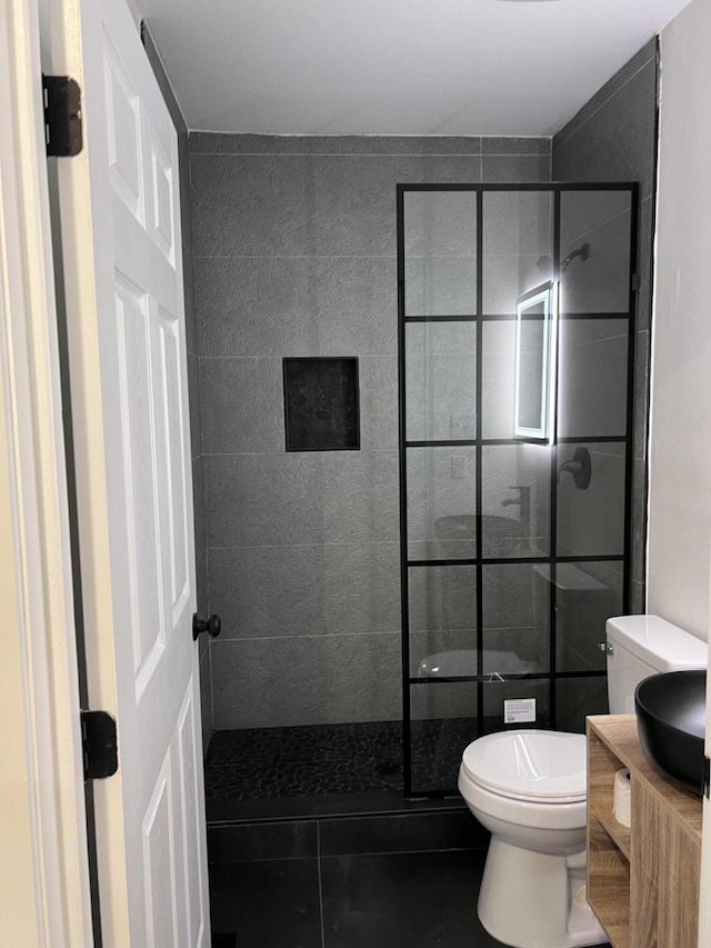 full bath featuring vanity, toilet, and a walk in shower