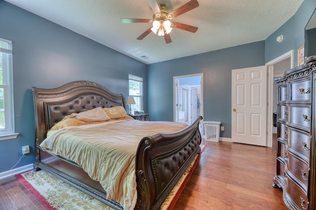 106 Trimley Ct, Goose Creek, SC 29445 - bedroom featuring wood finished floors, baseboards, a textured ceiling, and ceiling fan